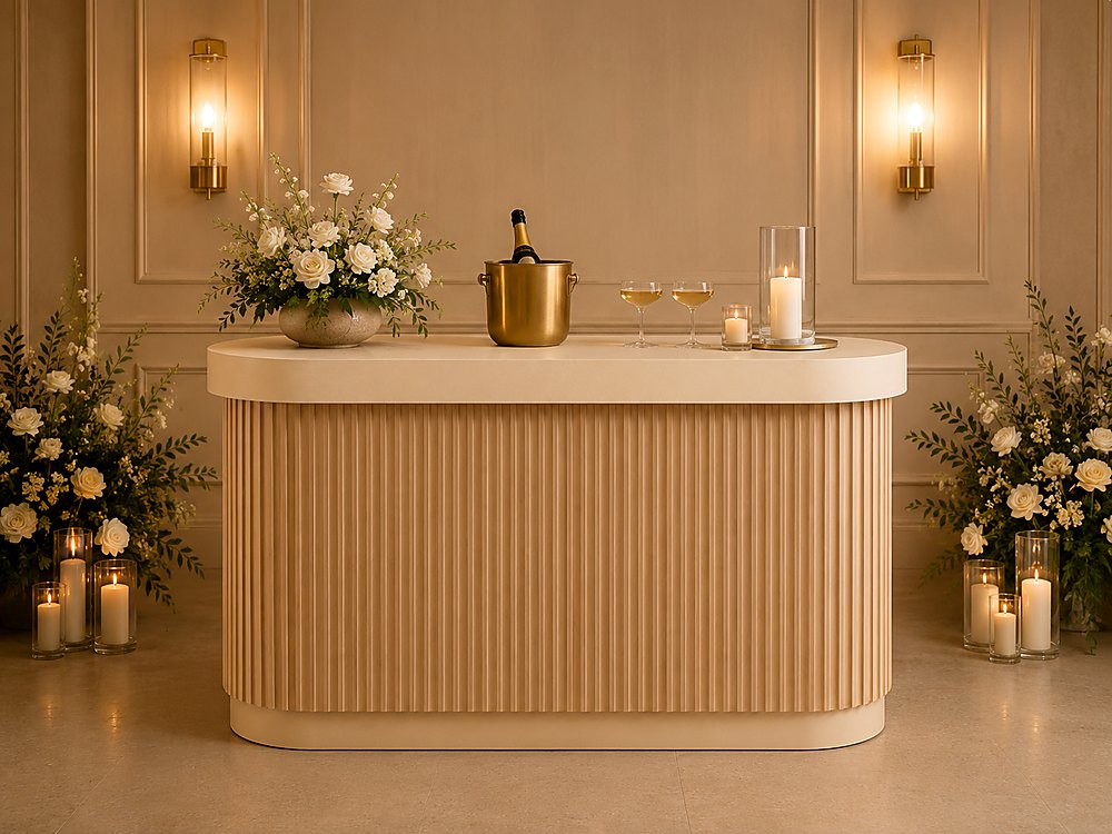 Styled design render: a fluted wood mobile bar with a pale counter, champagne on ice